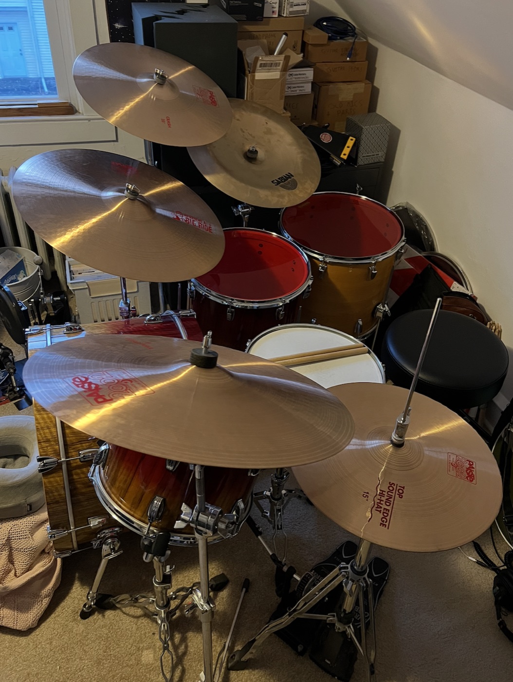 Ludwig and Gretsch drum kit setup with Paiste cymbals